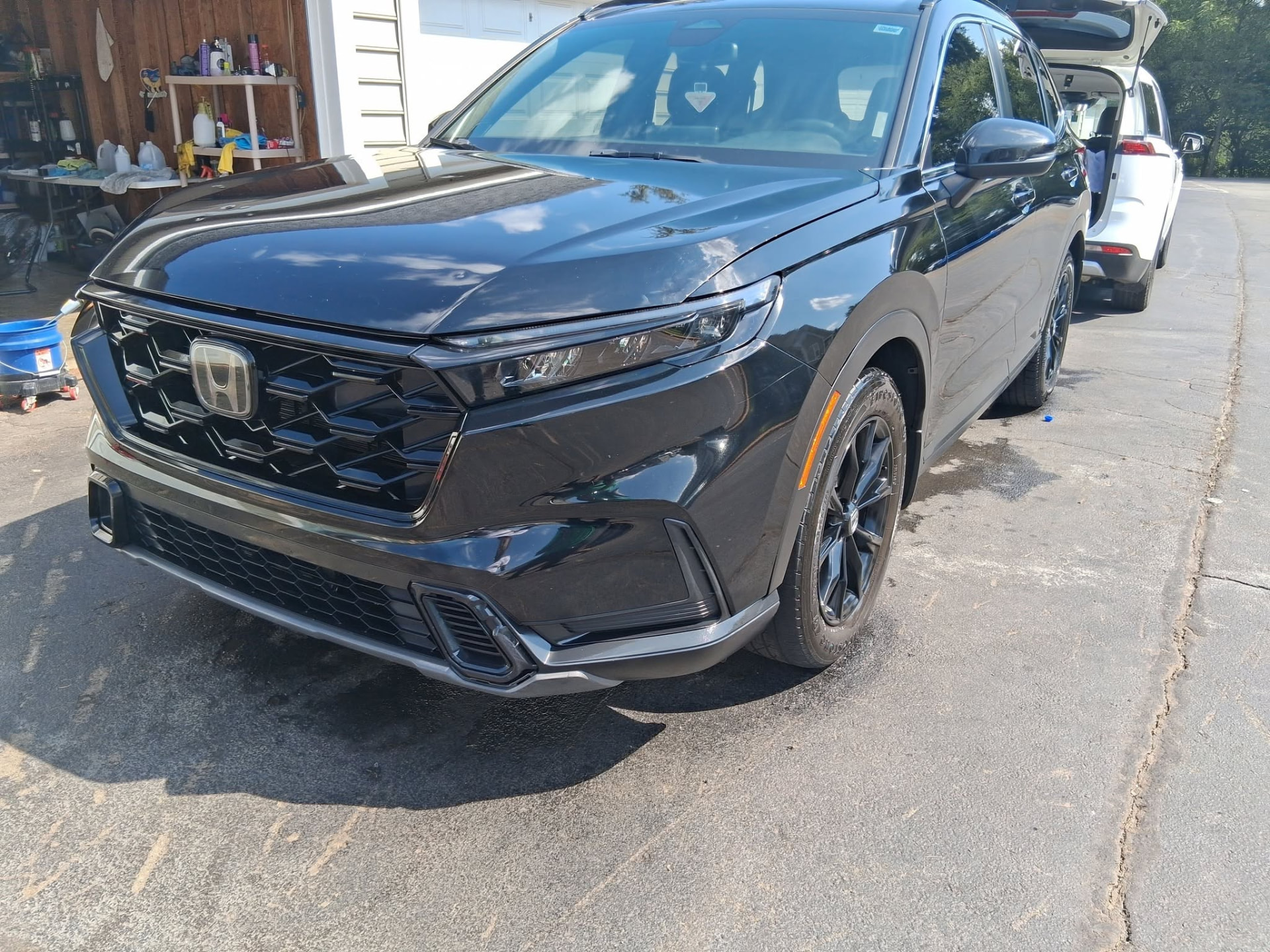 Freshly detailed black Honda CR-V with a mirror-gloss finish after a mobile detail in Mebane, NC